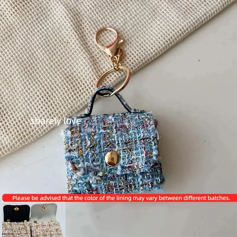 porte clés sac mini tweed bleu rose noir poignée métallique dorée monnaie écouteurs accessoire voyage compact