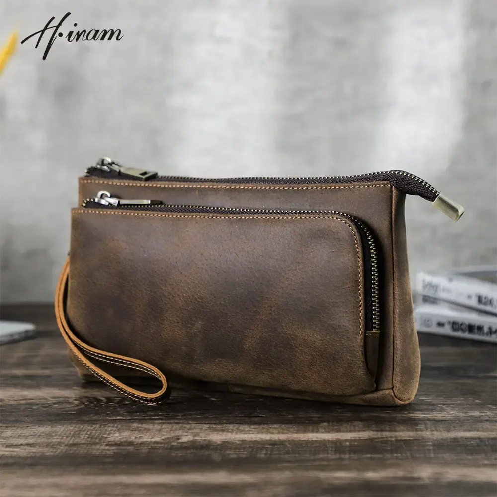 Peau de vache hommes pochettes en cuir véritable hommes d'affaires voyage sacs à main grande capacité câble organisateur pochette sac à main Style Vintage