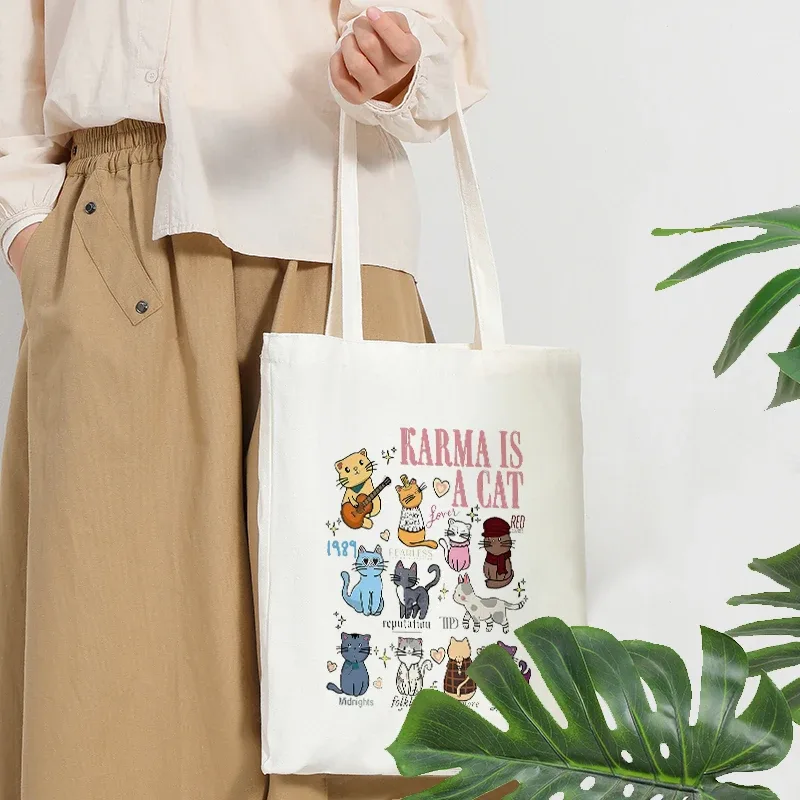 swifitie karma est un chat modèle sacs fourre-tout pour femmes pliable grand sac à main de voyage d'été pour les filles retour à l'école cadeau sac de plage