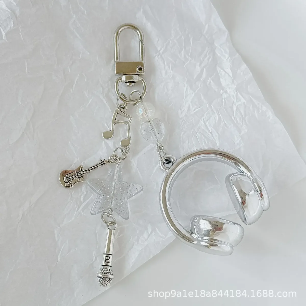 porte clé musical chaine métal accoutrements musicaux petit pendentif créatif voyage sac main pods casque bouton poussoir écouteurs accessoire voyage