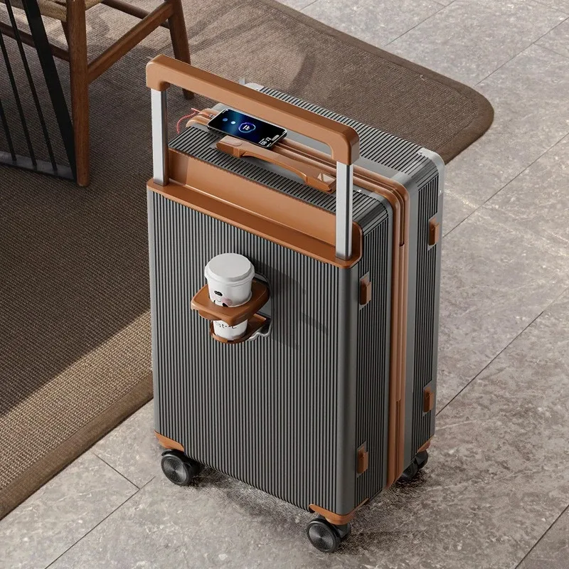 valise bagage roulettes abs beige clair marron toupie poignées bouton forme rectangulaire surface lisse texturée grande capacité usage voyage