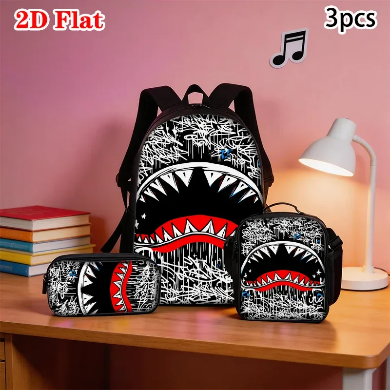 sac dos nylon noir motif requin graphique poignée souple bandoulière arquée compartiment principal poches latérales usage voyage école