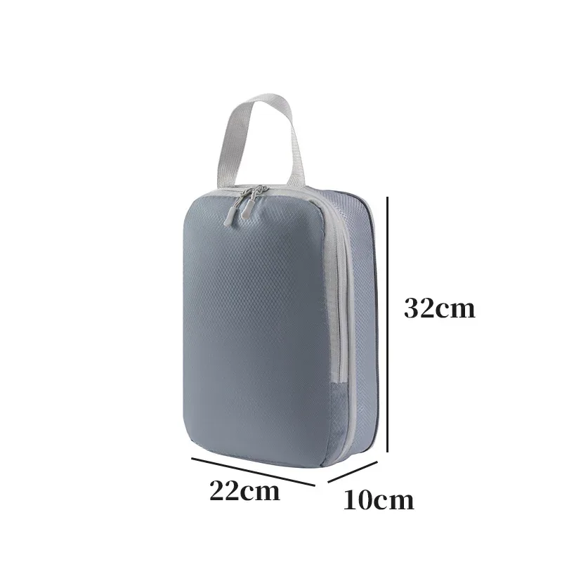organisateur voyage polyester blanc bandes grises format rectangulaire poignées grises compression vêtements articles toilette rangement valise