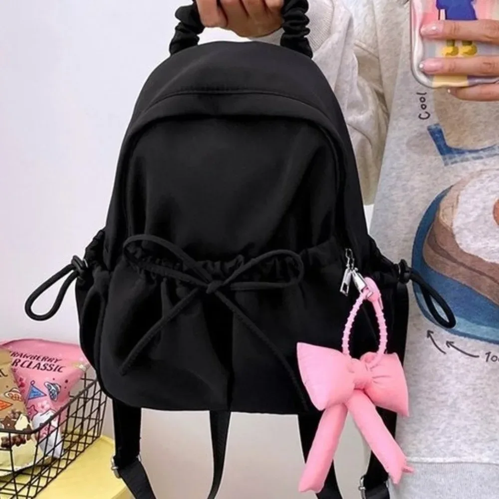 sac à dos en nylon pour étudiants avec cordon de serrage, bretelles réglables, design plissé, sac de voyage souple de grande capacité, sac à dos avec nœud.