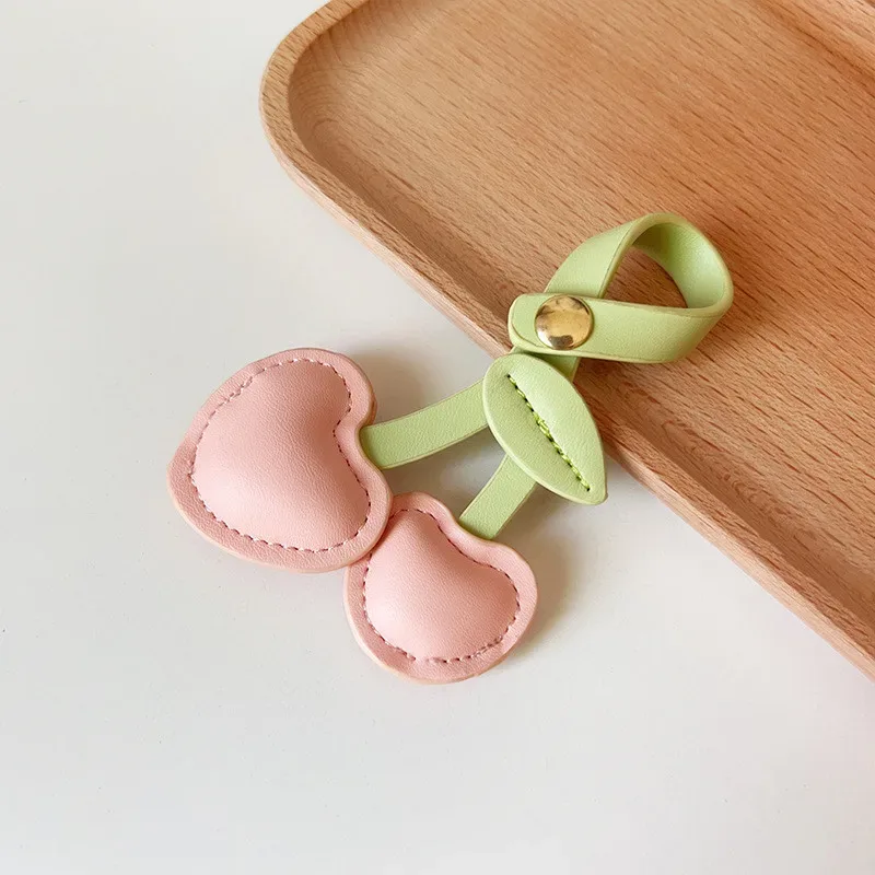 xmessun nouveau porte-clés pendentif cœur cerise rose pour sac à dos femme, breloque en cuir véritable tendance