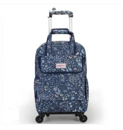 sac dos oxford université motif floral roses rouges fond bleu nuit toupie roulettes transport voyage femmes