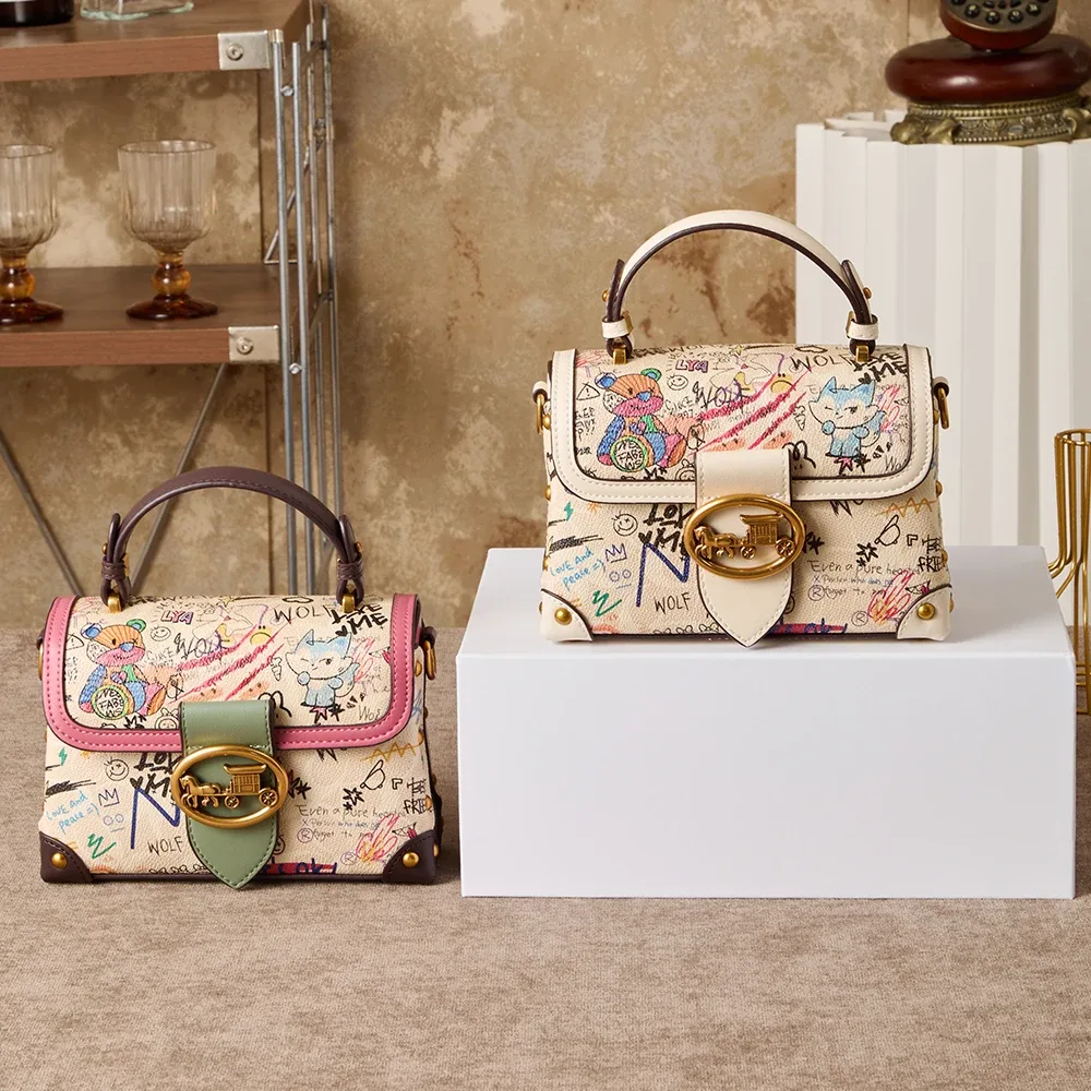 sac à main rétro graffiti avancé pour femmes, nouveau design de niche 2026, imprimé polyvalent, sac à bandoulière tendance.
