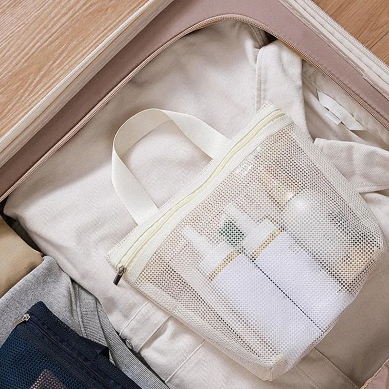 organisateur voyage nylon kaki violet blanc beige marron gris respirant compartiment suspension transport plage vacances