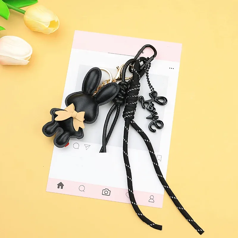 adorable porte-clés en cuir pu en forme de lapin avec petit nœud, pendentif animal mignon pour sacs à main et sacs à dos.