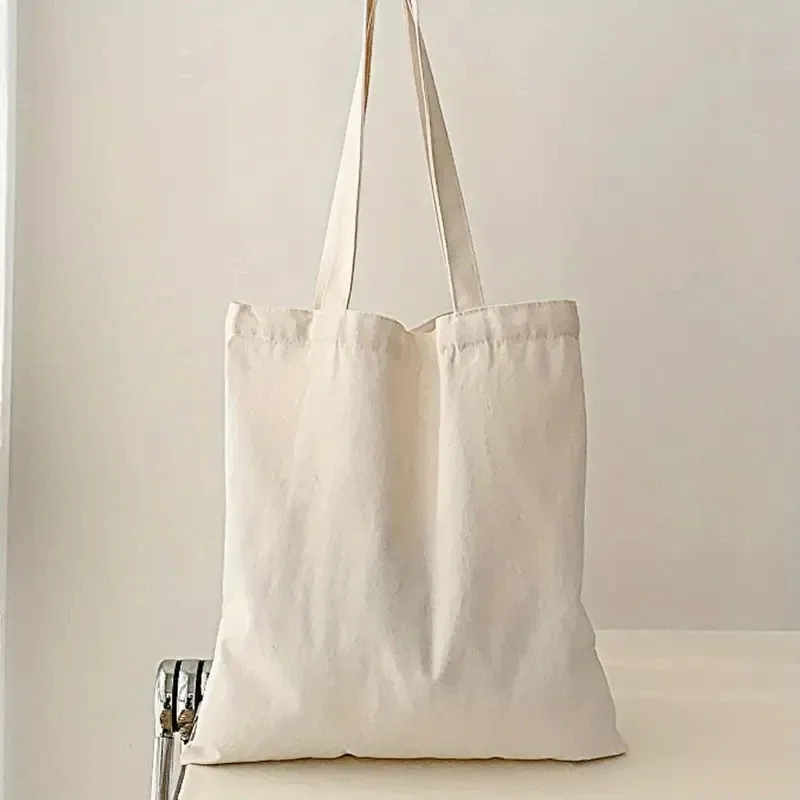 sac à main et sac à bandoulière pour femmes, simple et décontracté, en toile unie, grande capacité, idéal pour le shopping et les voyages.