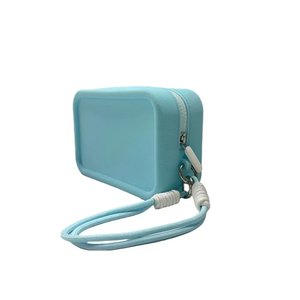 sac de maquillage en silicone couleur bonbon, avec corde de poignet tressée, sacs à cosmétiques portables avec lanière, sac de toilette étanche à fermeture éclair pour rouge à lèvres