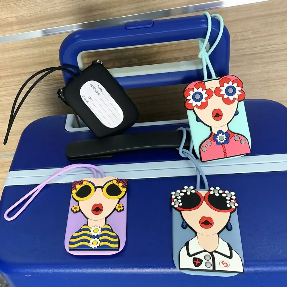 étiquette bagage caoutchouc visage lunettes fleurs géométrique bleu rose blanc voyage identification valise nom téléphone
