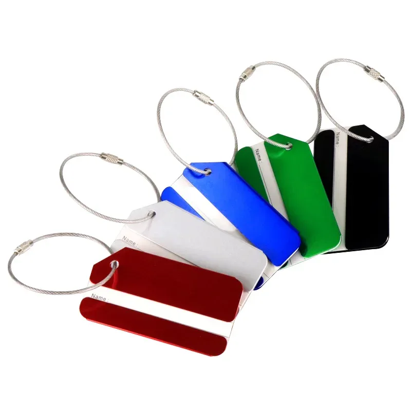 étiquette bagage métallique orange blanche bande horizontale géométrique identification voyage accessoires voyage porte adresses