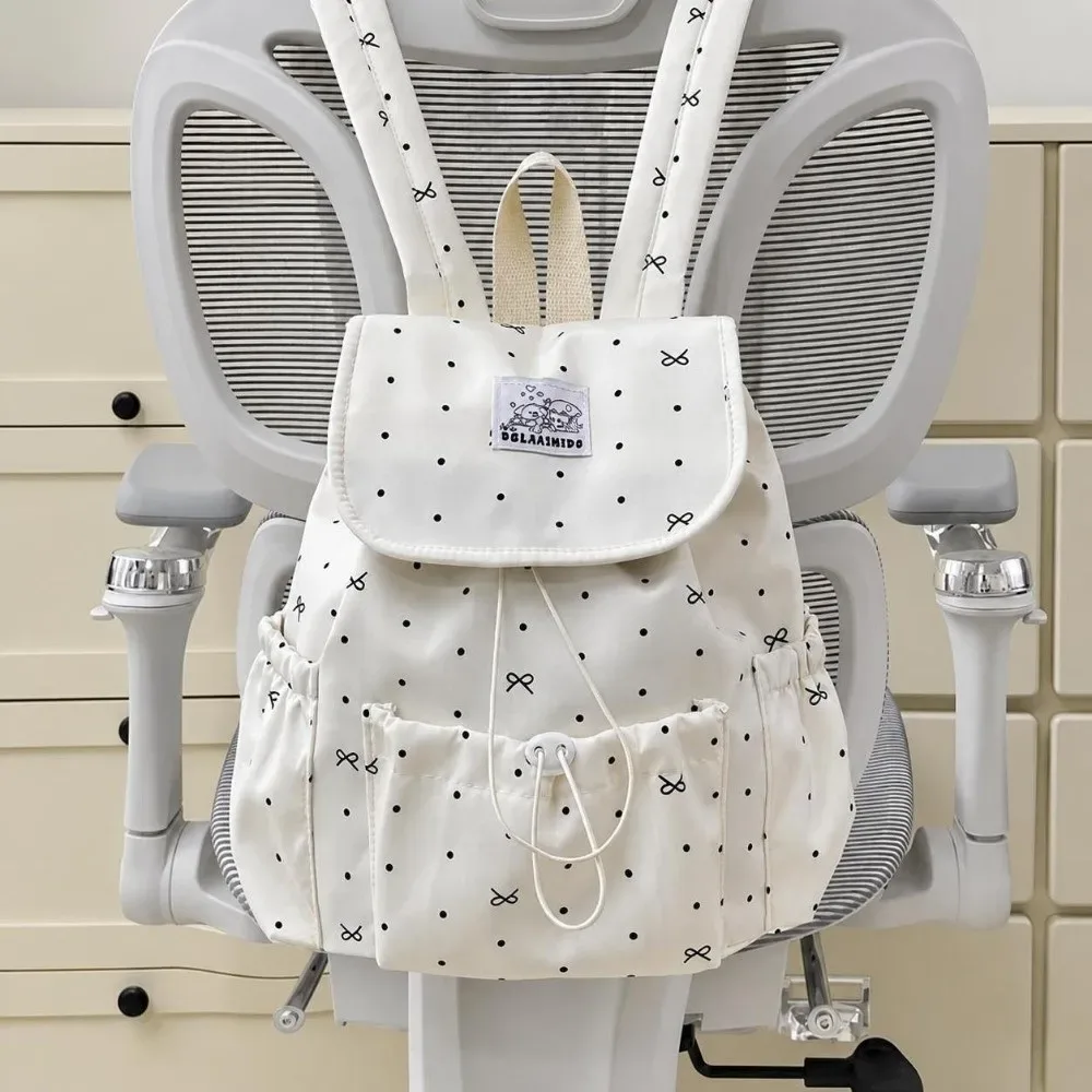 sac à dos à pois avec cordon de serrage, grande capacité, nœud décoratif, double bandoulière, ultra léger en nylon, idéal pour les trajets quotidiens et un usage décontracté.
