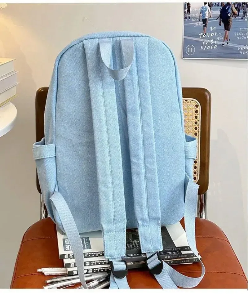 sac dos jean polyester noir bleu beige forme rectangulaire poches latérales transparentes visibilité intérieure informatique ceinture air décontracté usage quotidien