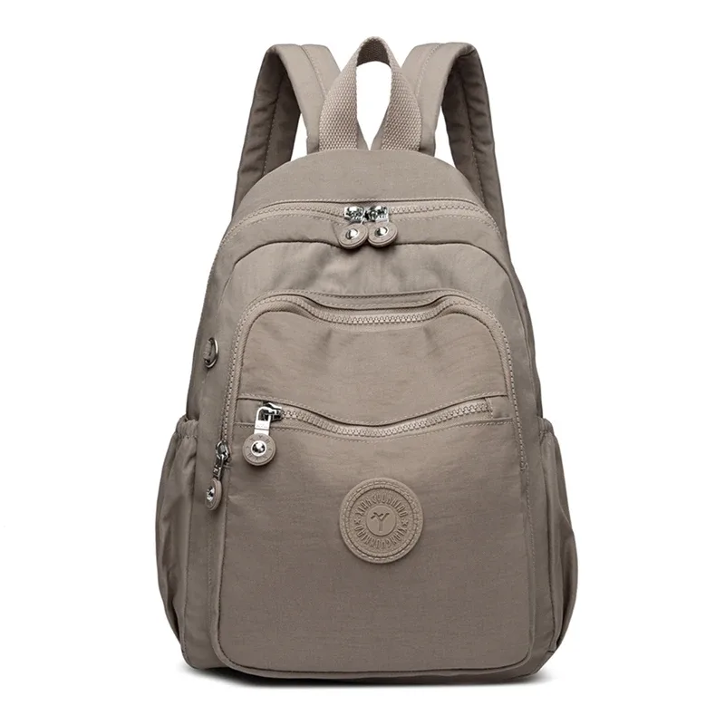 sac dos nylon unisexe noir poche latérale fermeture éclair doublure beige imprimé usage journalier