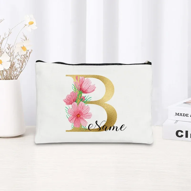 grande pochette zippée à motif floral rose et initiales dorées, organisateur d'essentiels de voyage en toile, trousse de maquillage pour enterrement de vie de jeune fille avec sac personnalisé avec nom.