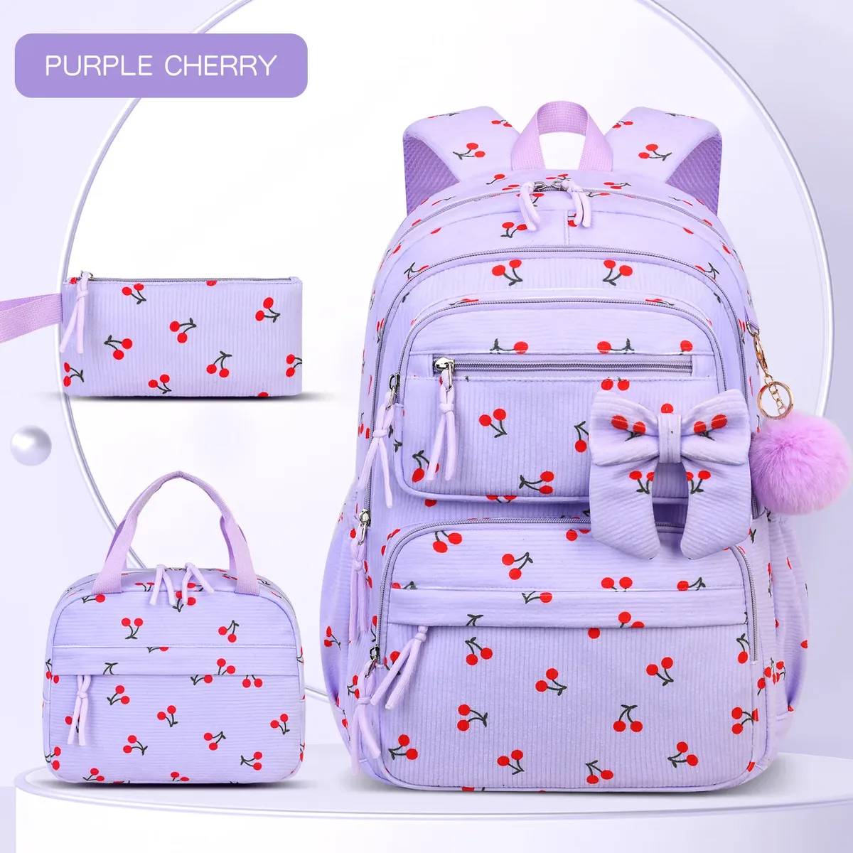 sac dos velours cotelé lavande cerises rouges bandoulières ajustables boucle pompon porte-clefs usage voyage école fille
