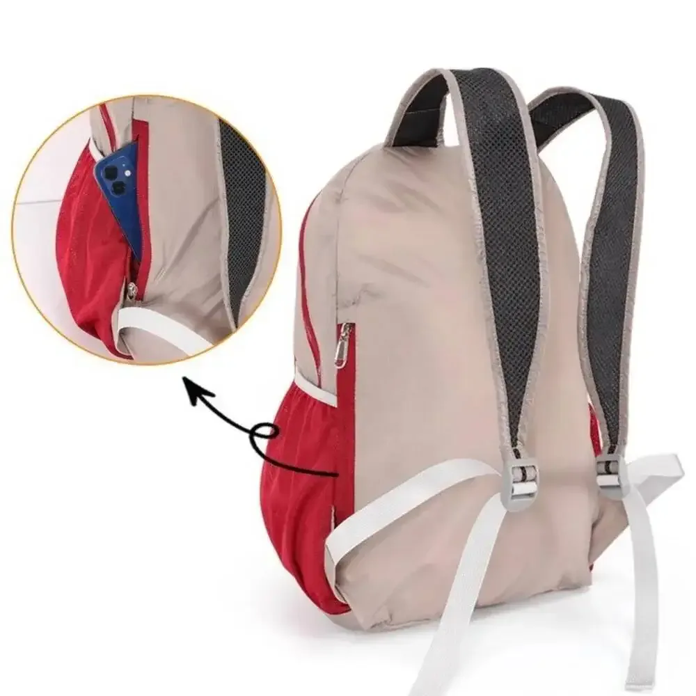 sac dos polyester gris clair rouge vif étoile stylisée pliable compact normcore minimaliste voyage loisir