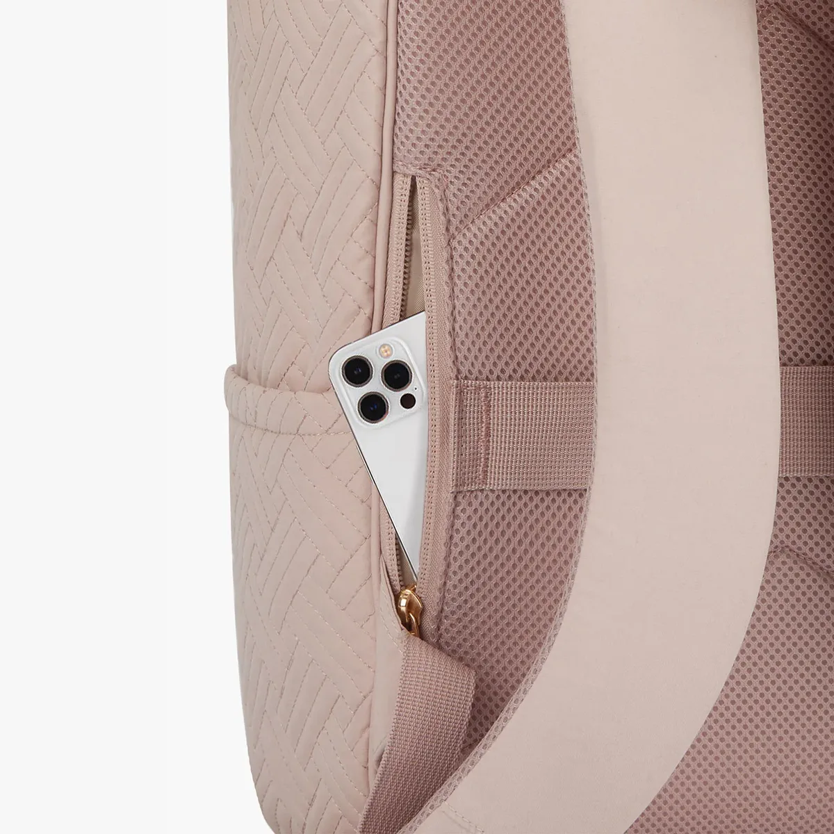 sac dos nylon rose pâle motif géométrique relief poches latérales grande ouverture fermeture glissière bandoulière arquée usage voyage universitaire
