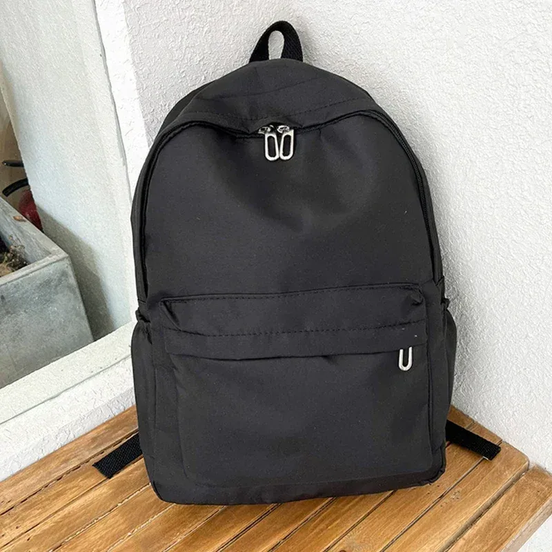 haute qualité nouveau imperméable à l'eau en nylon femmes sac à dos femme sac de voyage sacs à dos cartable pour adolescentes couleur unie bookbag