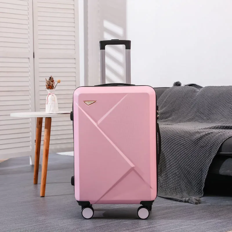 valise abs plastique dur motif géométrique lignes diagonales relief gris rose blanc jaune vert bleu rouge bagage affaires voyage