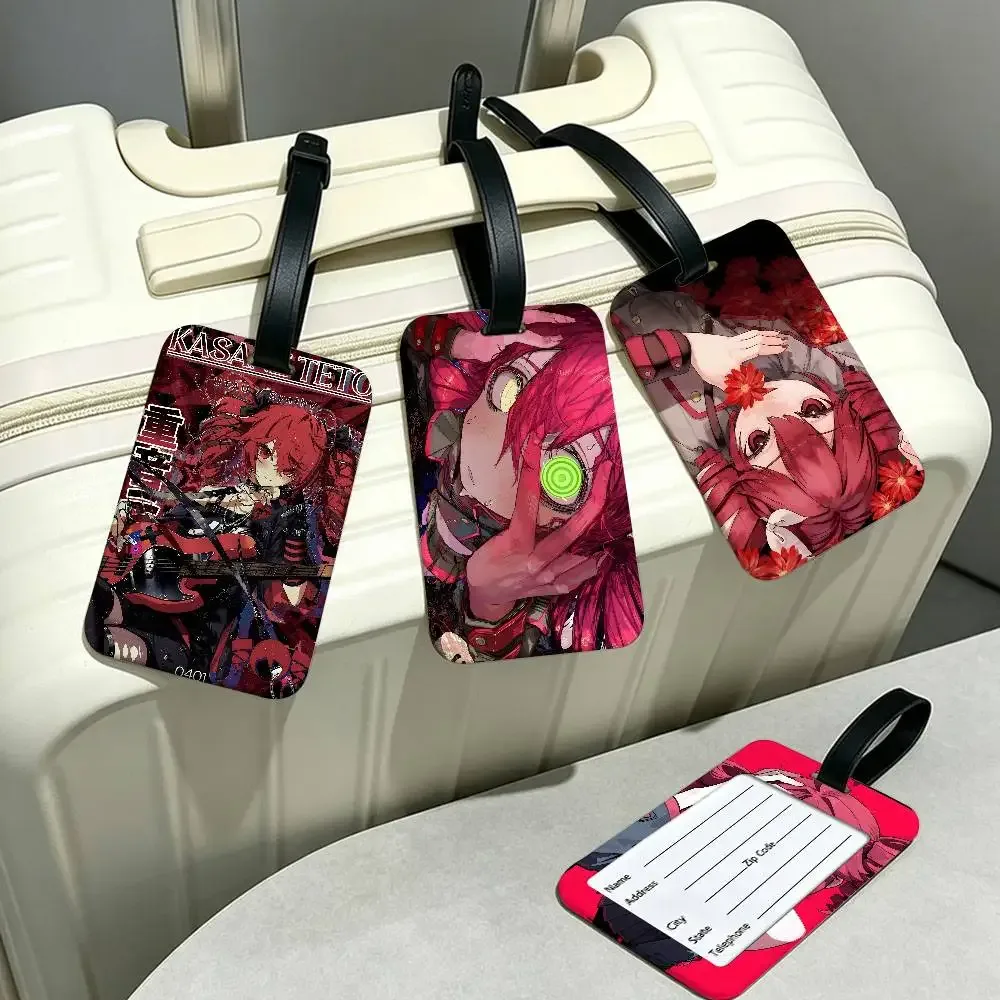 étiquette bagage plastique pvc motif femme cheveux rouges costume noir fond rouge noir poignée métal espace inscription contact usage voyage école identité
