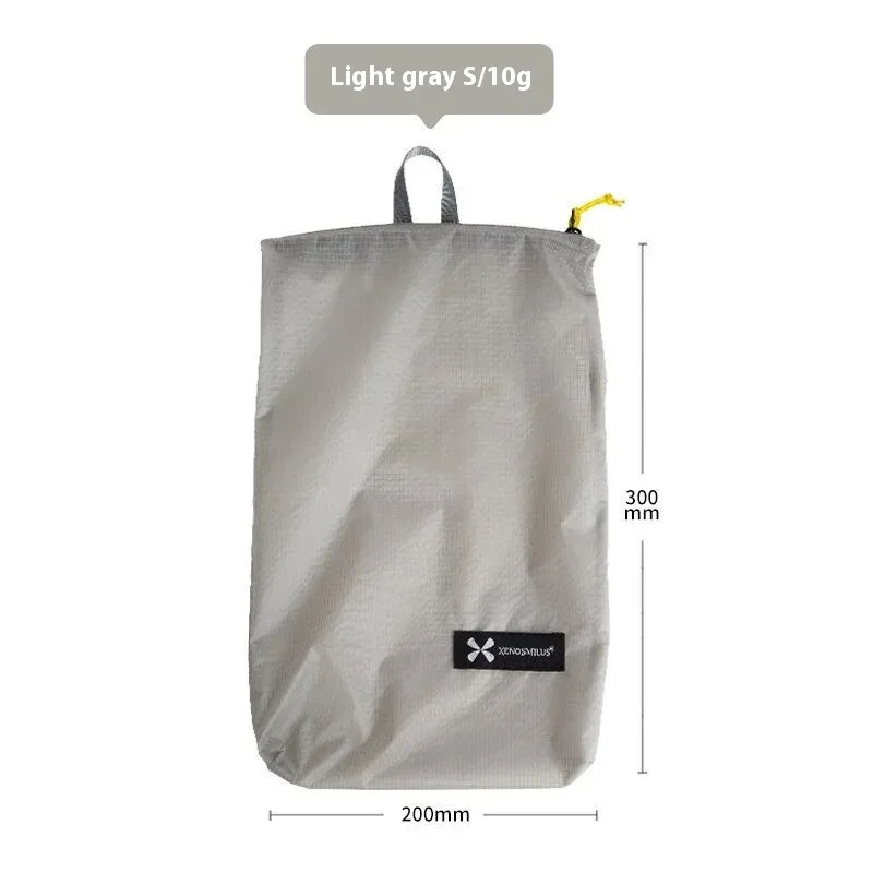 xenosmilus sac à dos de voyage portable ultra-léger avec trousse de toilette étanche, portefeuille pour passeport, pochette pour médicaments et documents