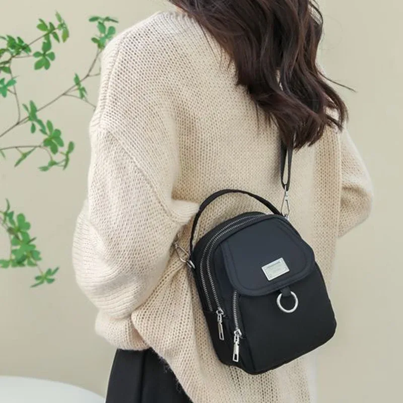 sac à dos convertible compact grace, sac en nylon léger de couleur unie avec large bandoulière amovible