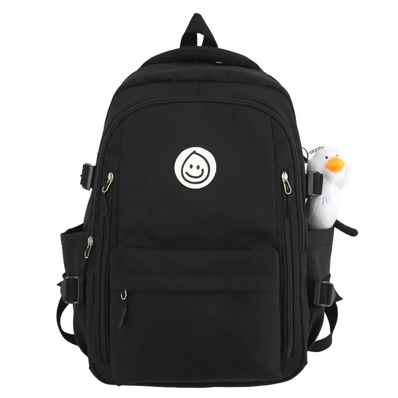 sac dos nylon blanc rouge bleu patchwork bandoulière arquée poche ouverte informatique classement souple voyager école collège
