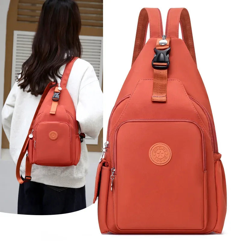 sac dos oxford tissu orange marron bandoulière arquée poignée rétractable loquet verrouillable intérieur chaussures bio coton capacité voyage