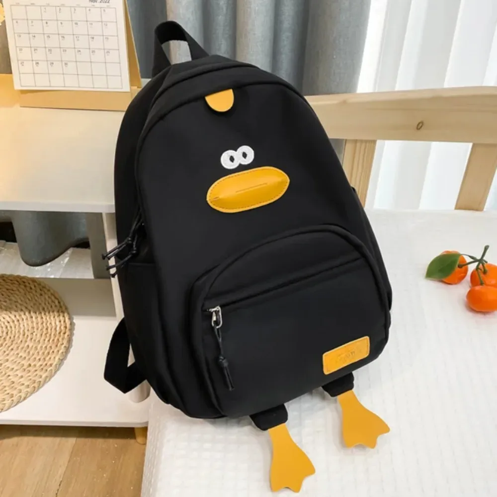 sac de voyage en nylon avec motif de canard de dessin animé, sac à dos à 3 couches avec poches zippées pour tout-petits, sac d'école de grande capacité pour étudiants et filles