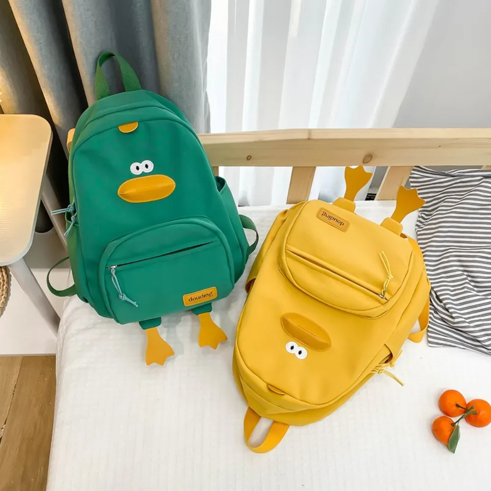 sac de voyage en nylon avec motif de canard de dessin animé, sac à dos à 3 couches avec poches zippées pour tout-petits, sac d'école de grande capacité pour étudiants et filles