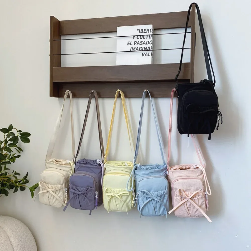 nouveau sac bandoulière léger pour téléphone portable pour femme, sac de sport et cyclisme d'extérieur, porte-bouteille d'eau, sac de voyage, sacs à main au design noué