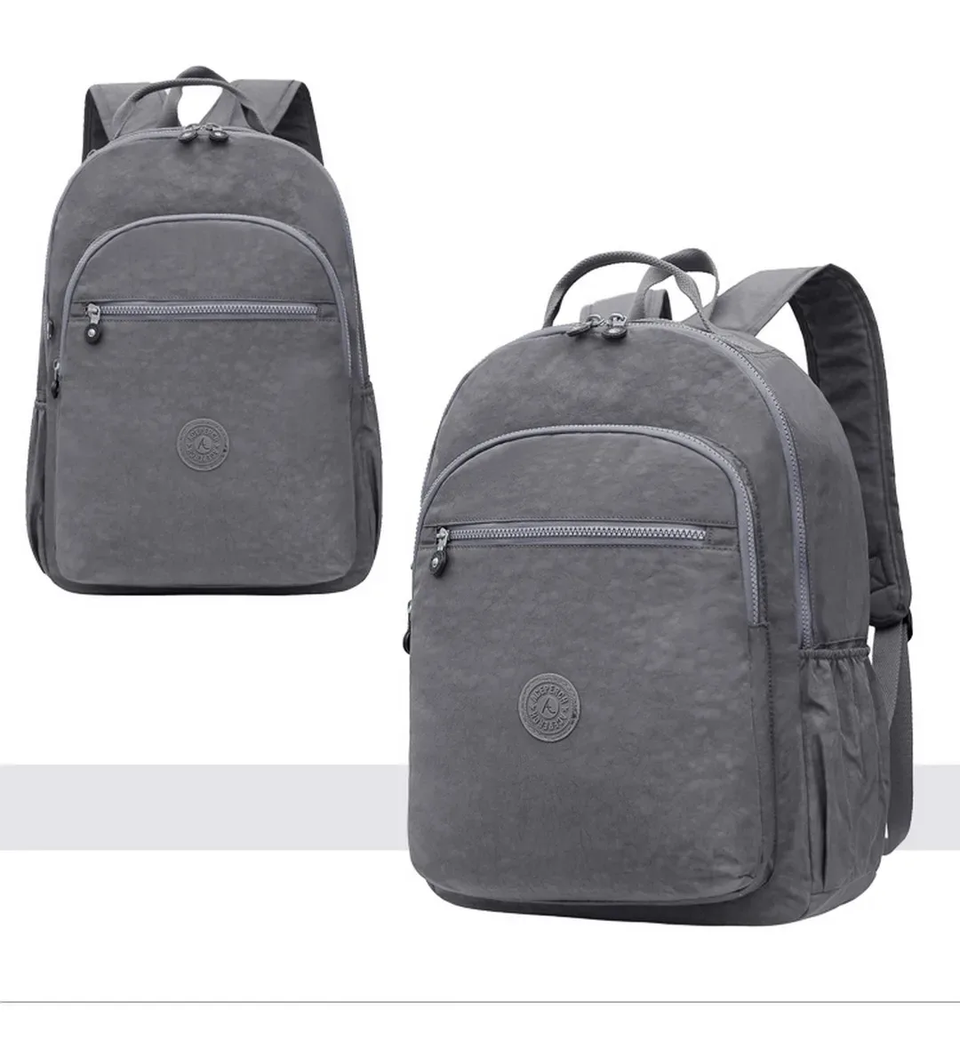sac dos nylon gris anthracite compartiments poches latérales glissière accessoires pompon porte monnaie voyage école adolescente