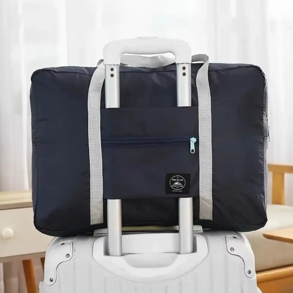 sac à main de voyage en polyester durable, couleur unie, étanche, bagage à main, sac à bandoulière pliable de grande capacité, sac de sport pour femmes et hommes