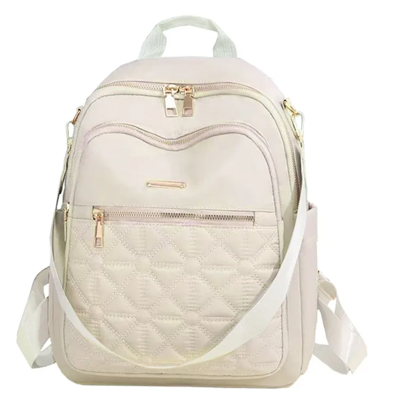 sac à dos élégant en nylon matelassé pour femmes, sac à dos avec quincaillerie dorée, sac à bandoulière multi-emplacements pour les activités de voyage et de shopping décontractées