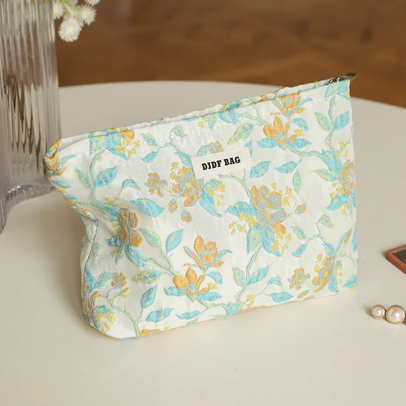 trousse toilette polyester floral fleur rose vert violet blanc motif géométrique marguerites bleu jaune voyage grande capacité