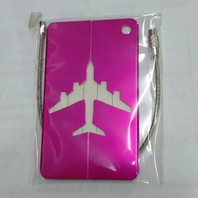 étiquette bagage métallique noire blanc avion voyage identification anti-perte accessoires pliable pièces unies motif solidité usage