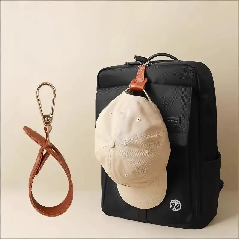 clip universel pour chapeau, fixation facile pour casquette, maintient solidement les casquettes de baseball et les casquettes à queue de cheval, idéal pour les bagages, les sacs à dos et les voyages quotidiens.