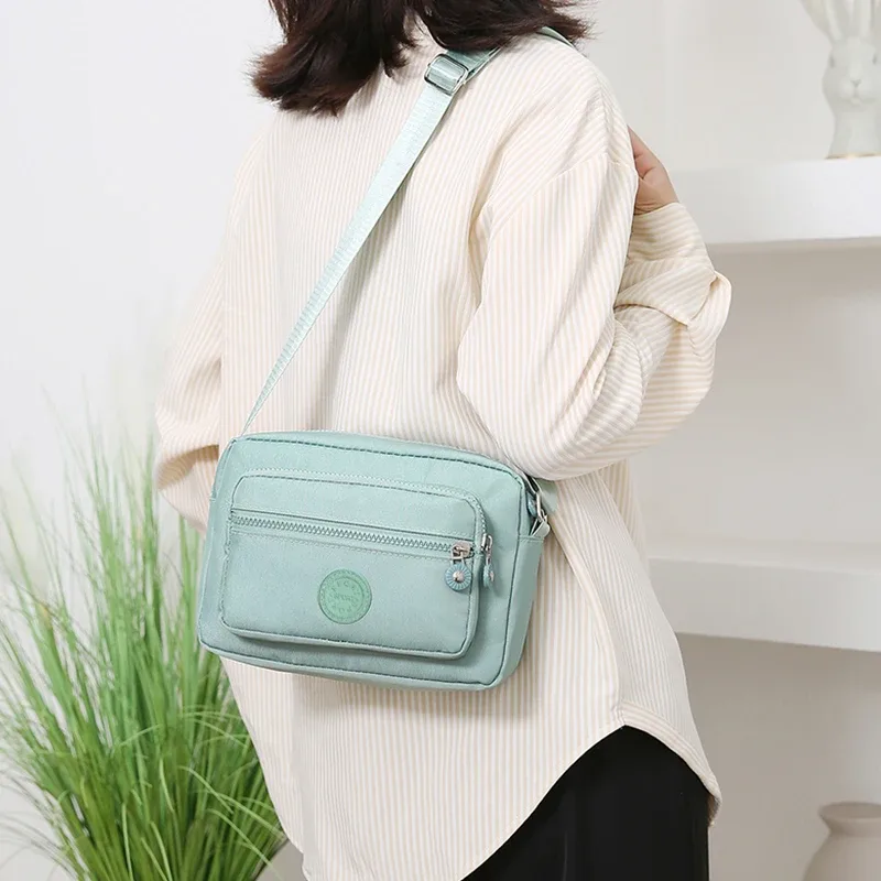sac bandoulière multi-poches de couleur unie pour femme, sac à épaule multifonctionnel, sac d'affaires tendance de la même couleur