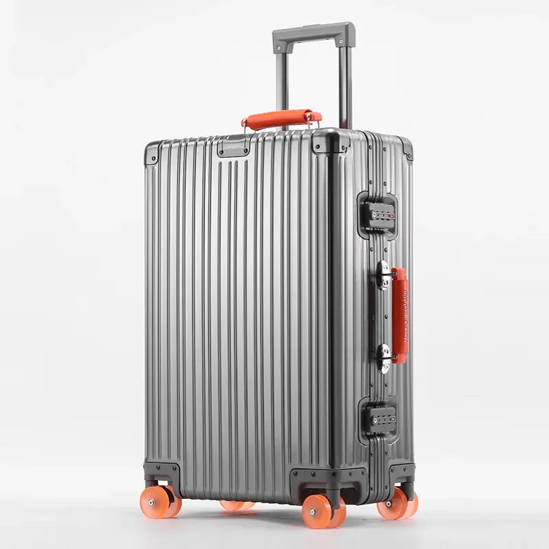 valise aluminium argenté roulettes oranges toupies ergonomiques poignées verticales voyage affaires élégante robuste durables