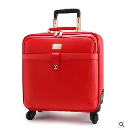 valise carrée cuir marron accents dorés roulettes quatre coins ceinture maintien intérieur marron affaires voyage