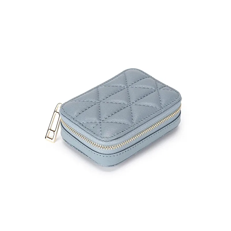 organisateur voyage cuir vache motif rayé blanc noir rose bleu carré zip décontracté cosmétiques maquillage