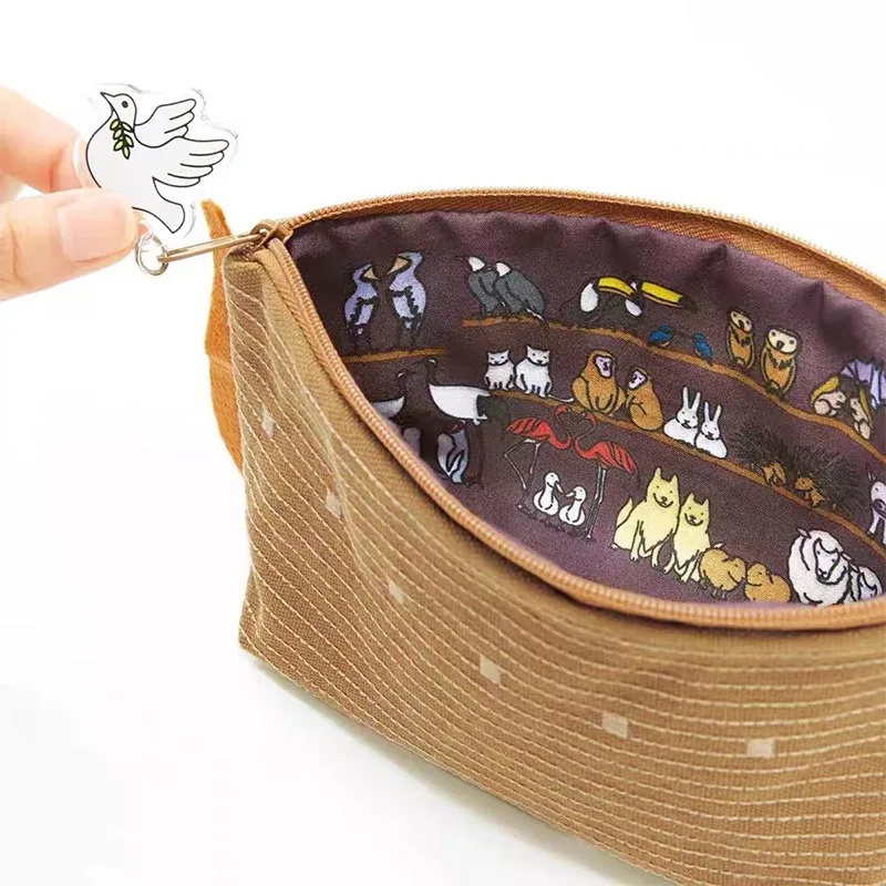 pochette voyage nylon motif vagues bleues intérieur noir stylos crayon rangement fournitures papeterie cosmétiques transport