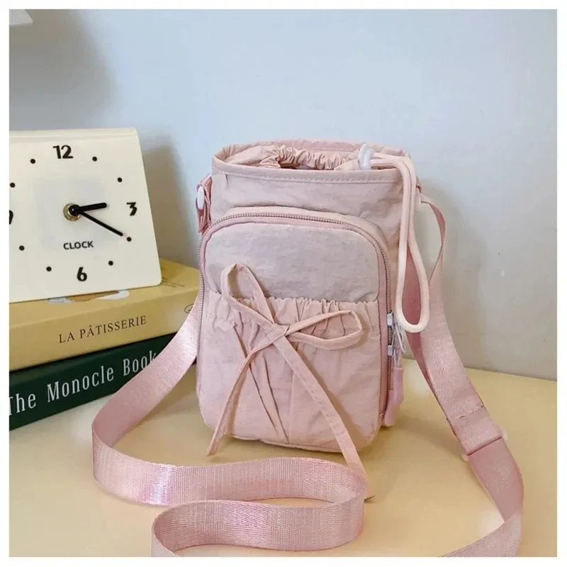 nouveau sac bandoulière léger pour téléphone portable pour femme, sac de sport extérieur, sac de cyclisme, porte-bouteille d'eau, sac de voyage, design à nœuds