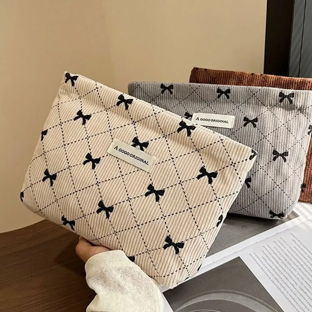 sac de maquillage en velours côtelé avec nœud papillon, sac de rangement portable pour soins de la peau, trousse de toilette