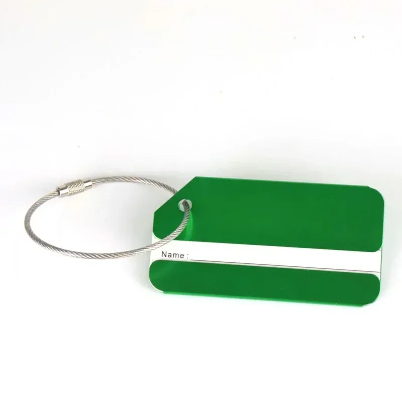 étiquette bagage métallique rectangulaire bande blanche anneau suspension couleurs variées voyage identification valise embarquement