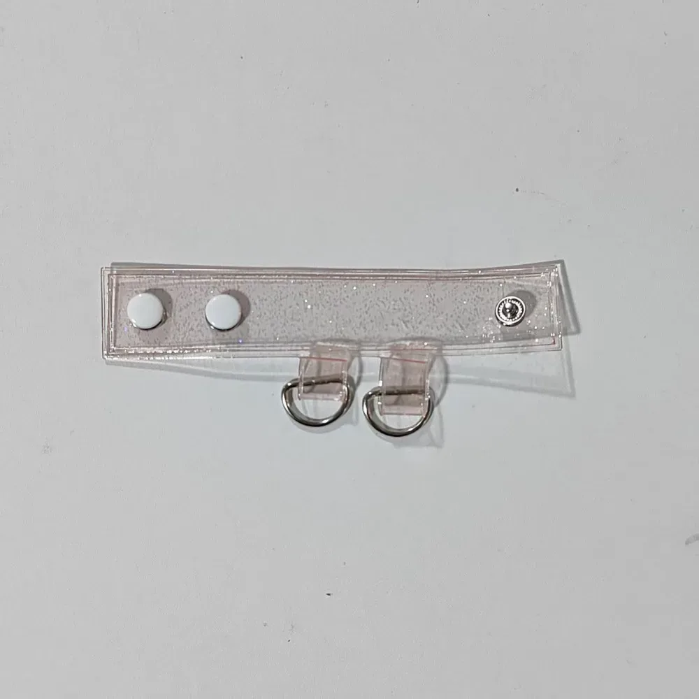 clip fixation sangle sac transparent anneaux métalliques boule centrale extension accessoires voyage polyvalent durables