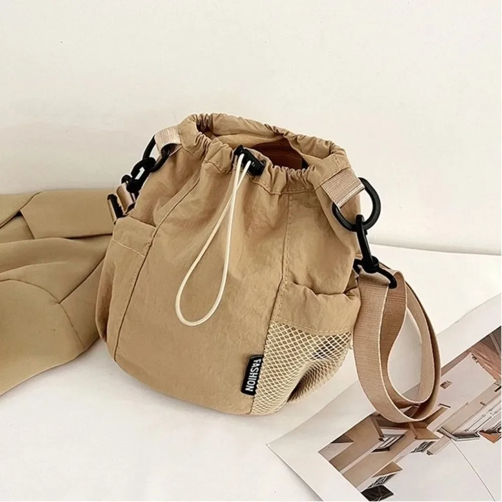 sac à bandoulière simple portable en nylon, petit sac léger de couleur unie pour l'extérieur